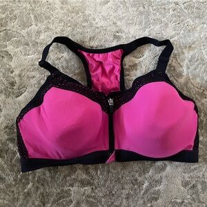 Wacoal sports bra pink/ black sz 36C, padded, under wire, front zipper closure